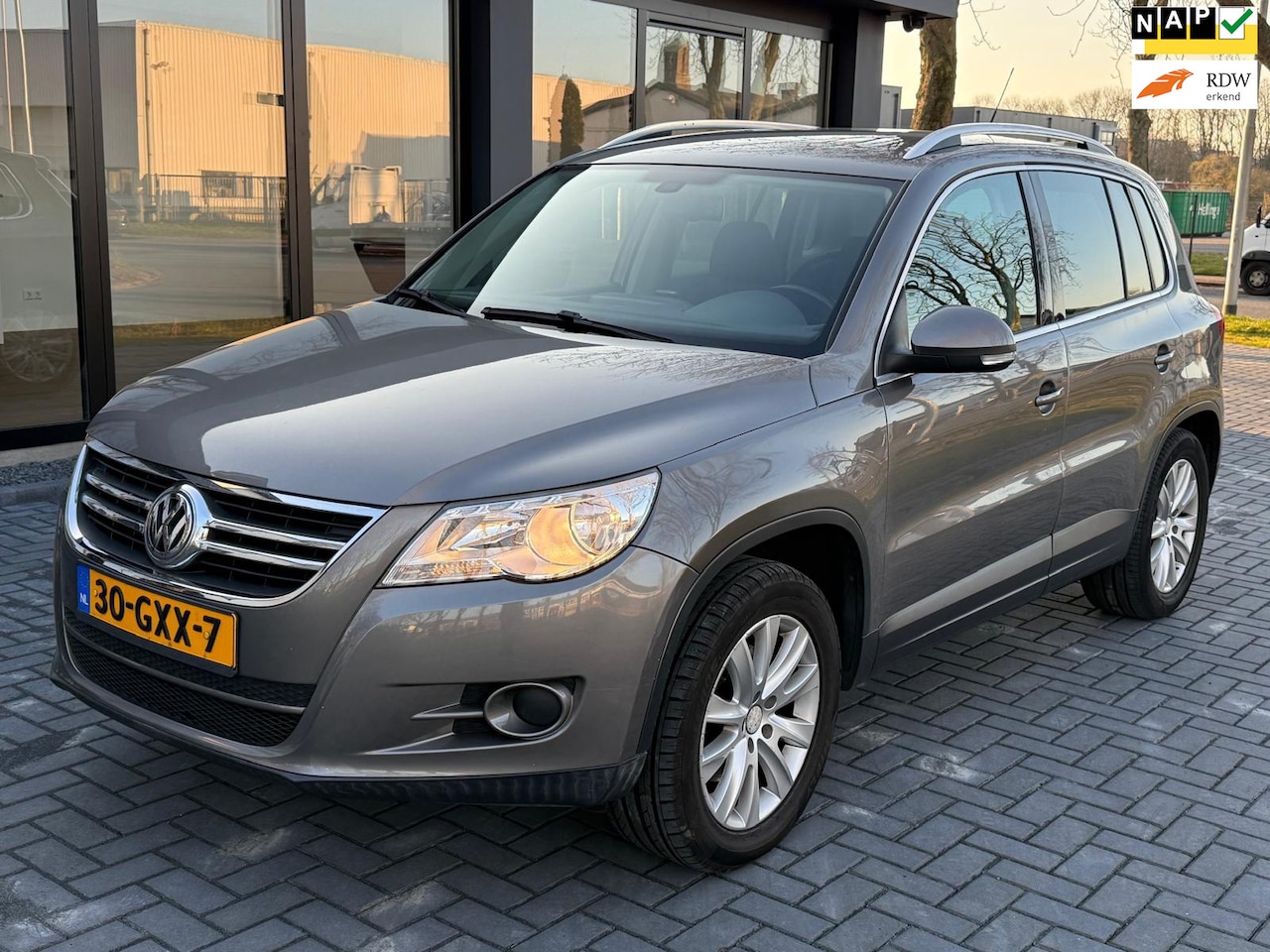 Volkswagen Tiguan - 2.0 TSI Sport&Style 4Motion Automaat - AutoWereld.nl