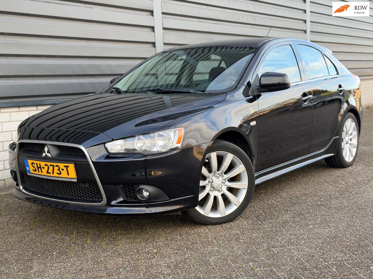 Mitsubishi Lancer Sportback - 1.8 Intense Cruise trekhaak 143PK - AutoWereld.nl