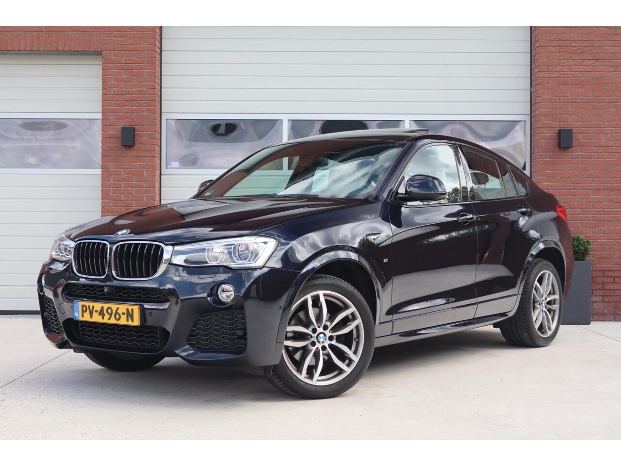 BMW X4 - XDrive20i High Executive M Sport Edition - HUD - Schuif kanteldak - 360 camera - Trekhaak - AutoWereld.nl