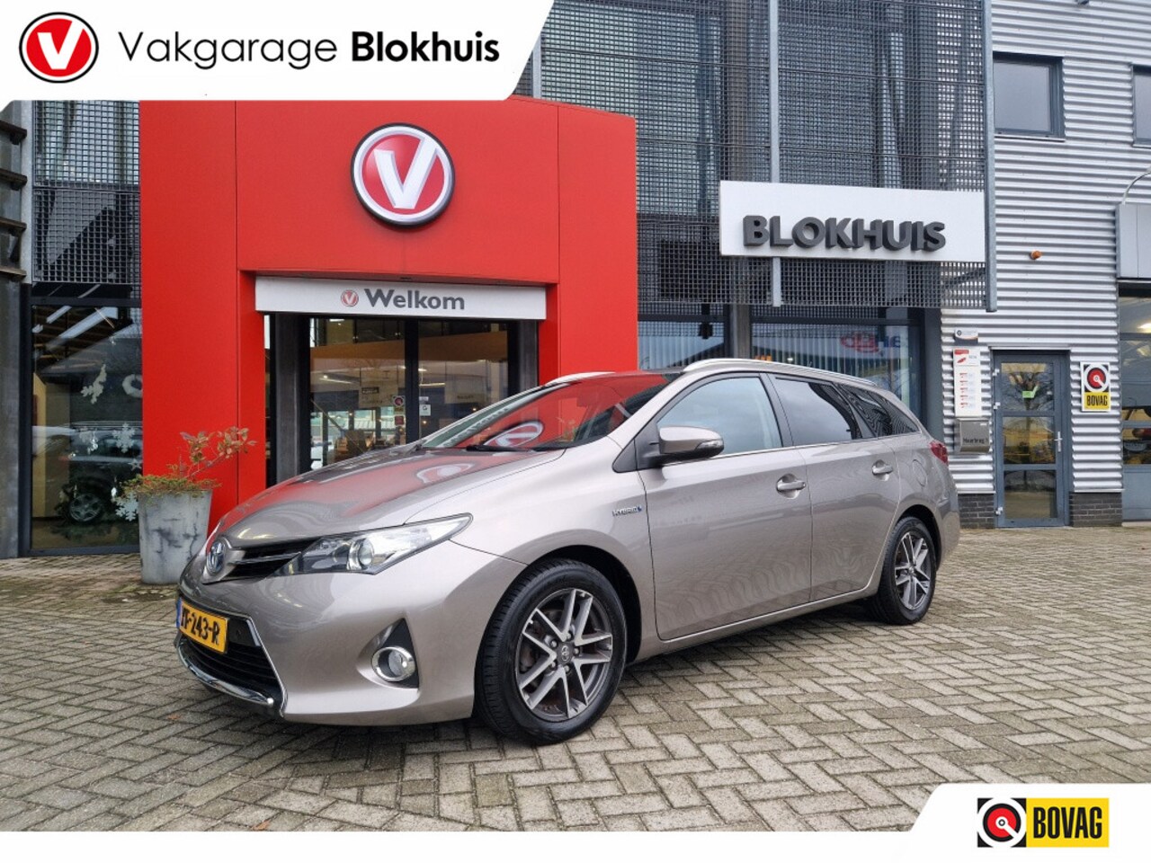 Toyota Auris Touring Sports - 1.8 Hybrid Dynamic | Navi | LMV | Cruise - AutoWereld.nl