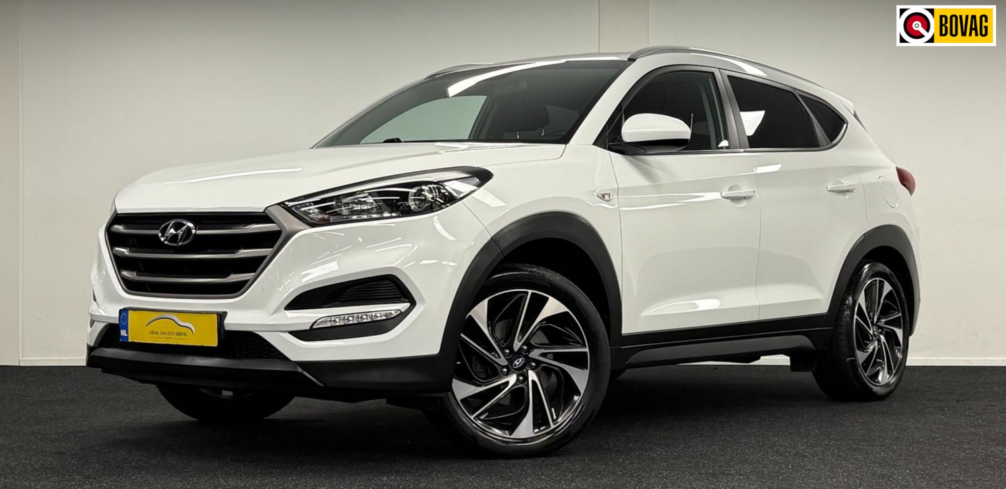 Hyundai Tucson - 1.6 GDi Premium*DealerOh*Trekhaak*Navi*Camera*Carplay*Stoelverw - AutoWereld.nl