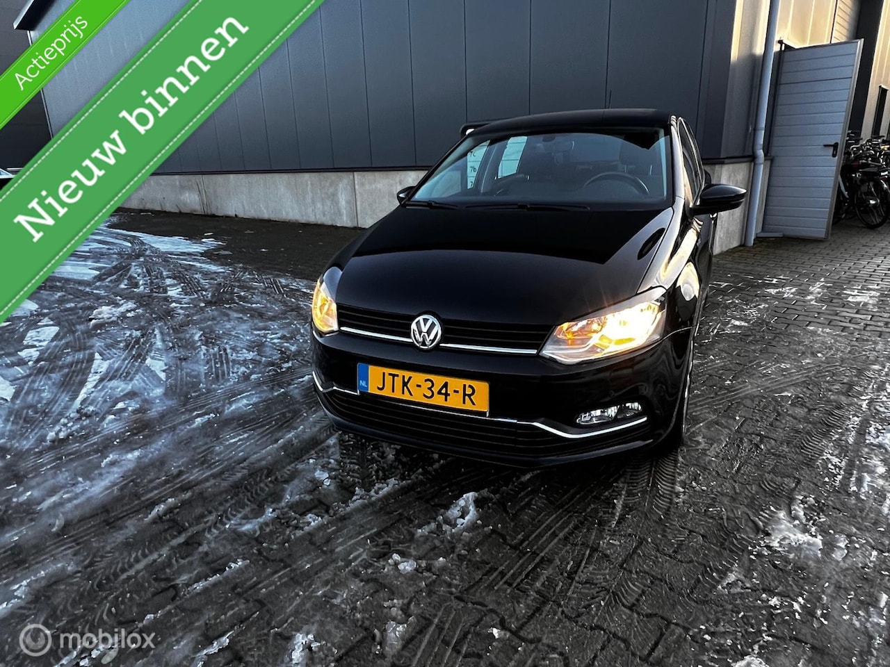 Volkswagen Polo - 1.0 Comfortline 2014 zwart - AutoWereld.nl
