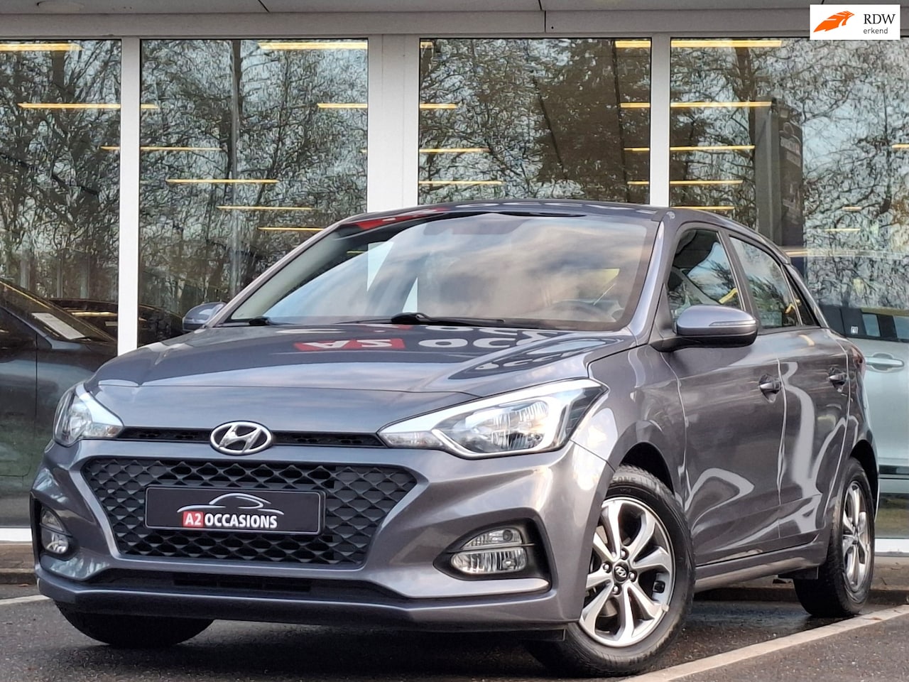Hyundai i20 - 1.2 4 Cilinder Cruise/Bluetooth/Stoel+Stuurverw/All Season banden - AutoWereld.nl