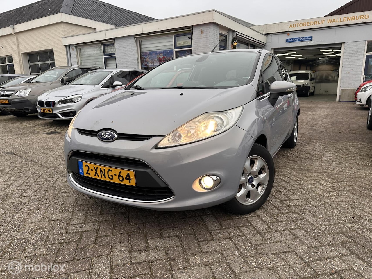 Ford Fiesta - 1.25 Ghia 1.25 Ghia - AutoWereld.nl