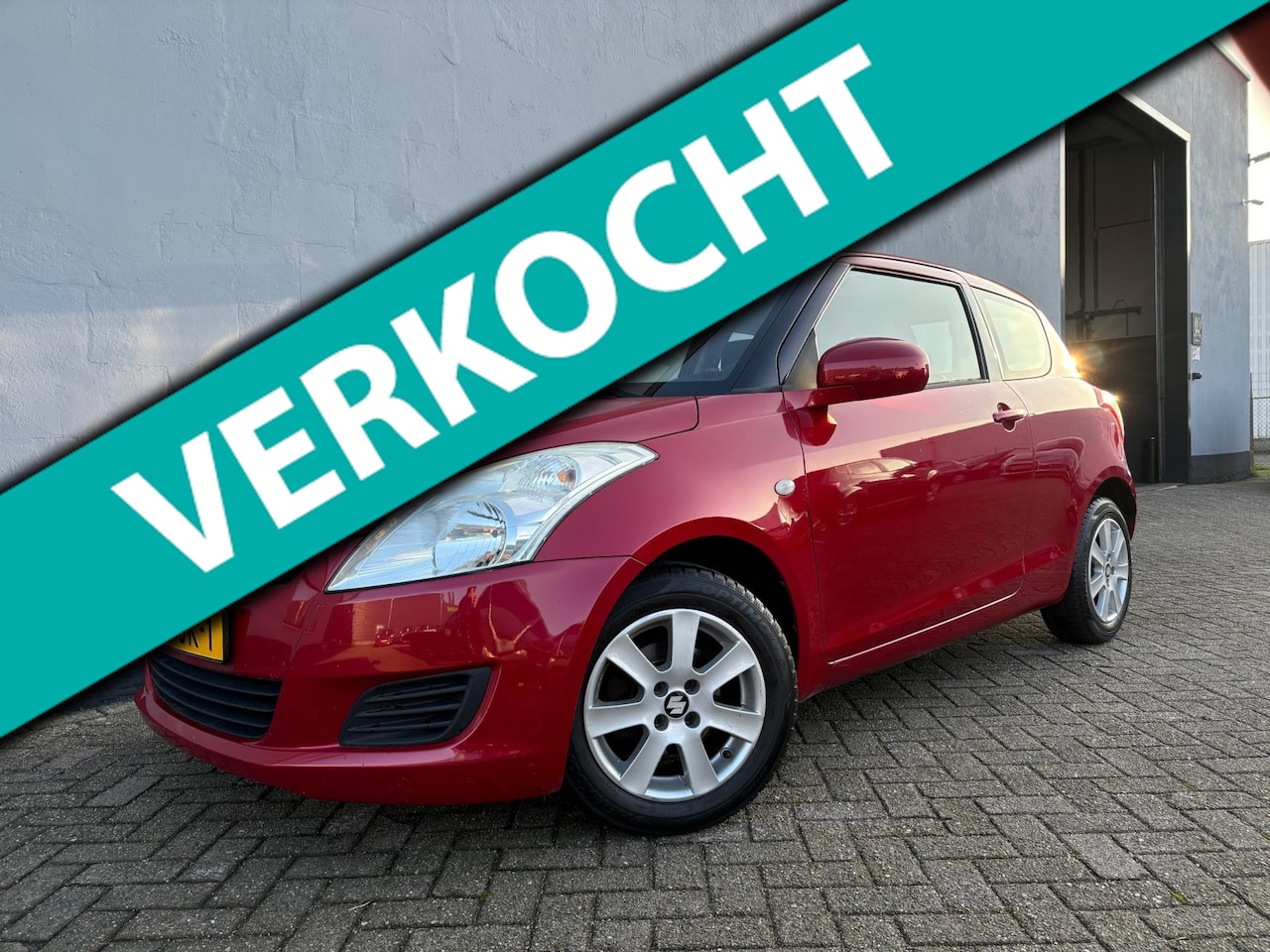 Suzuki Swift - 1.2 Comfort - Airco - Elek. Kantel/Schuif Dak - LMV - AutoWereld.nl