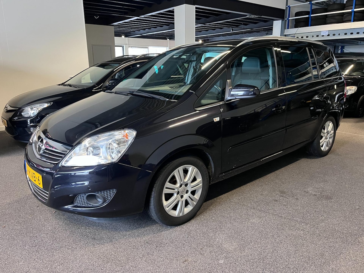 Opel Zafira - 1.8 Cosmo 7 P Isofix 1/2 Trekhaak Ecc Navi NW APK Leder - AutoWereld.nl