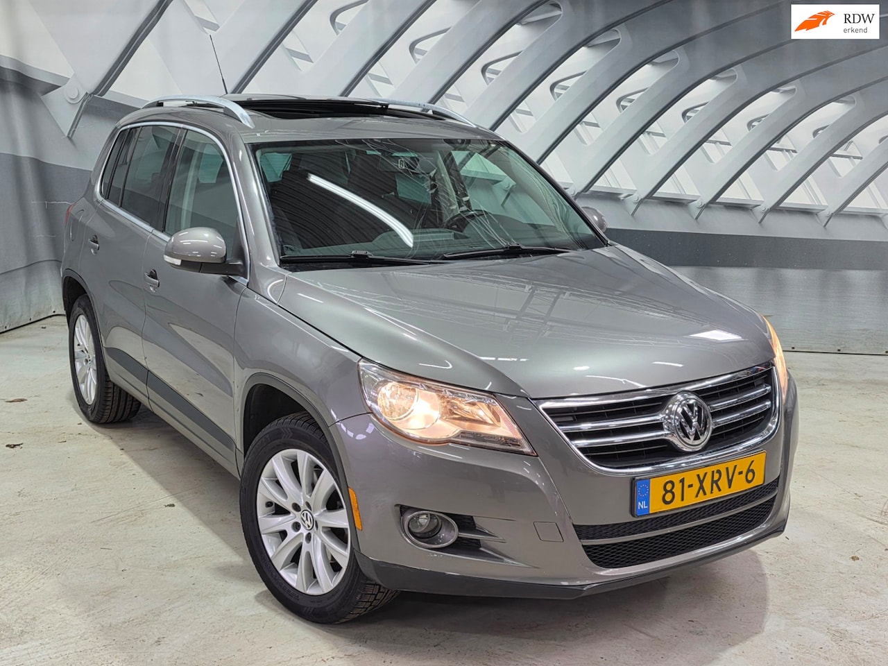 Volkswagen Tiguan - 2.0 TSI DSG 4Motion panoramadak - AutoWereld.nl