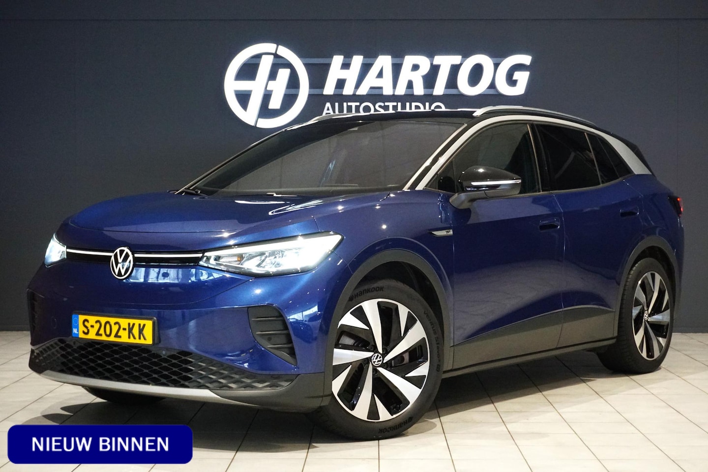 Volkswagen ID.4 - First 77 kWh + WEGKLAPBARE TREKHAAK / STUURVERWARMING / VOORKLIMATISERING - AutoWereld.nl
