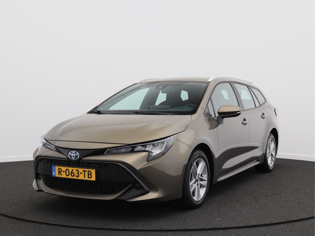 Toyota Corolla Touring Sports - 1.8 Hybrid Active/ lage km/ zeer mooi! - AutoWereld.nl