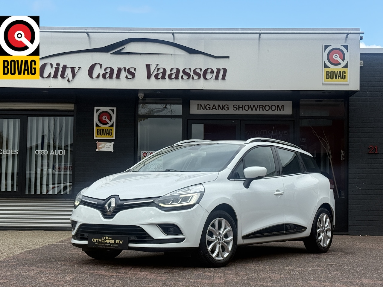 Renault Clio - Grandtour intens 0.9 TCe Intens org nl auto nap logisch navi climate ctr cruise ctr dagrij - AutoWereld.nl
