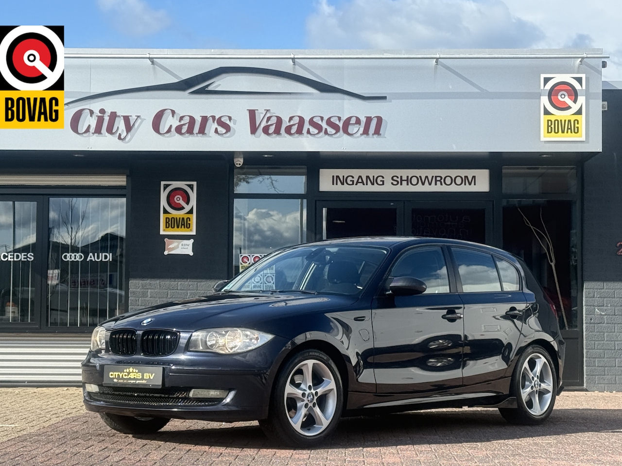 BMW 1-serie - 116i Business Line 122 pk org nl auto nap logisch climate ctr cruise ctr 5 deurs  start/st - AutoWereld.nl