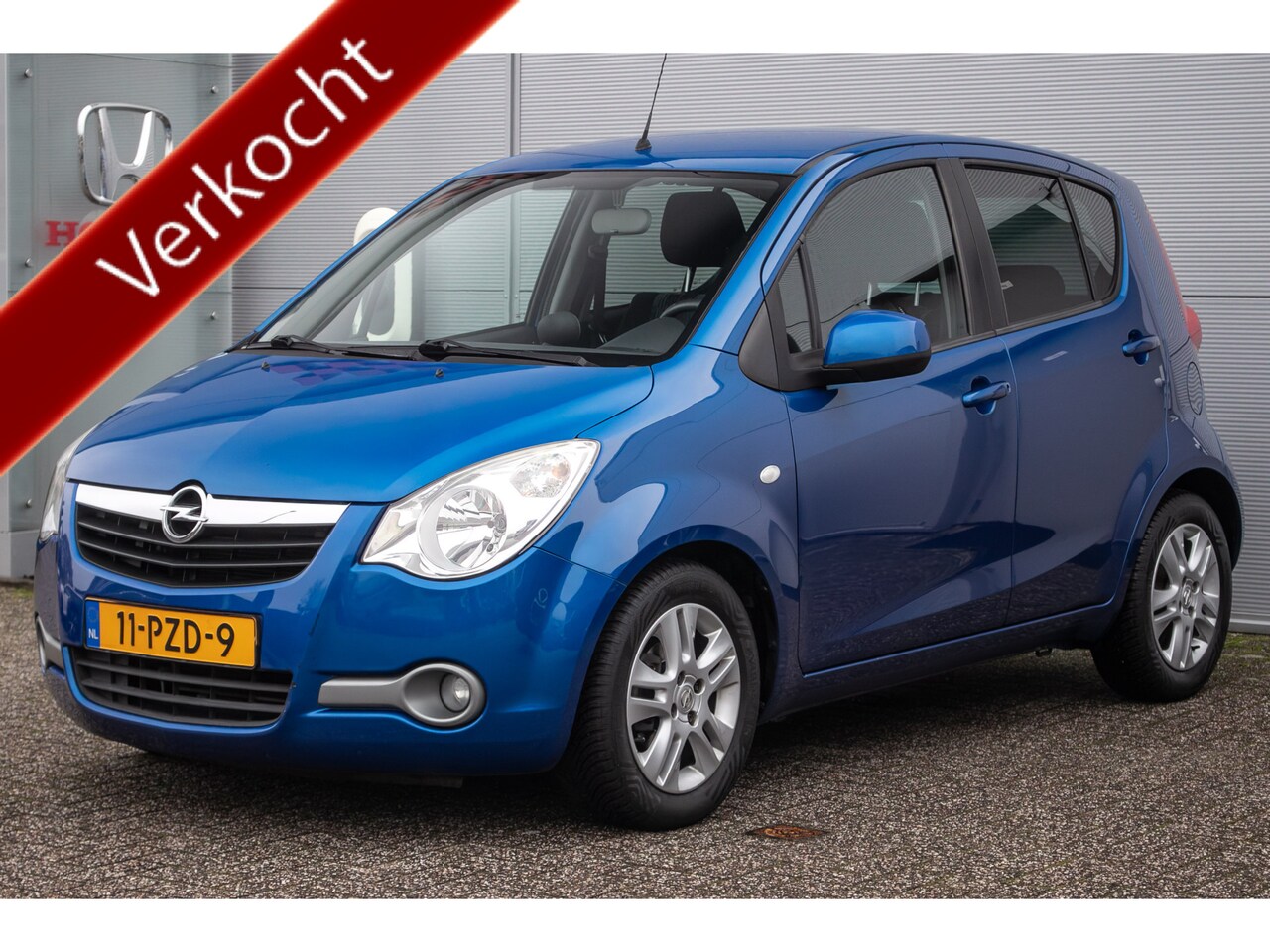 Opel Agila - 1.2 Edition Automaat | Airco | PDC | All-seasonbanden | Toerenteller - AutoWereld.nl