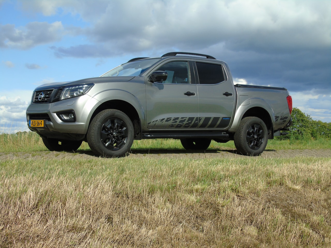 Nissan Navara - 2.3 dCi New N-Guard Double Cab - AutoWereld.nl