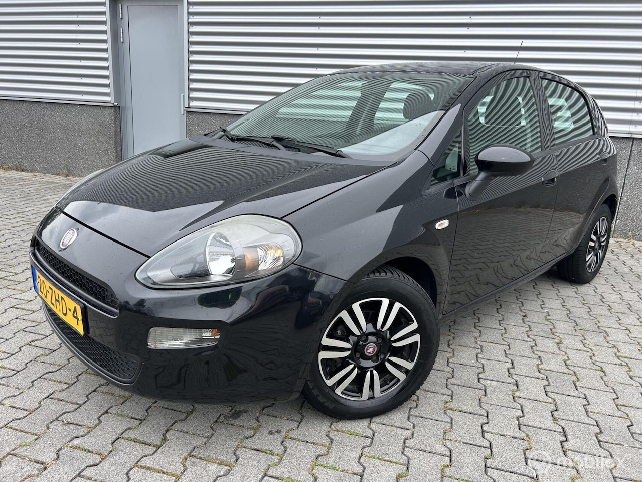 Fiat Punto Evo - 0.9 TwinAir Lounge 2012 nieuwe apk, PDC - AutoWereld.nl