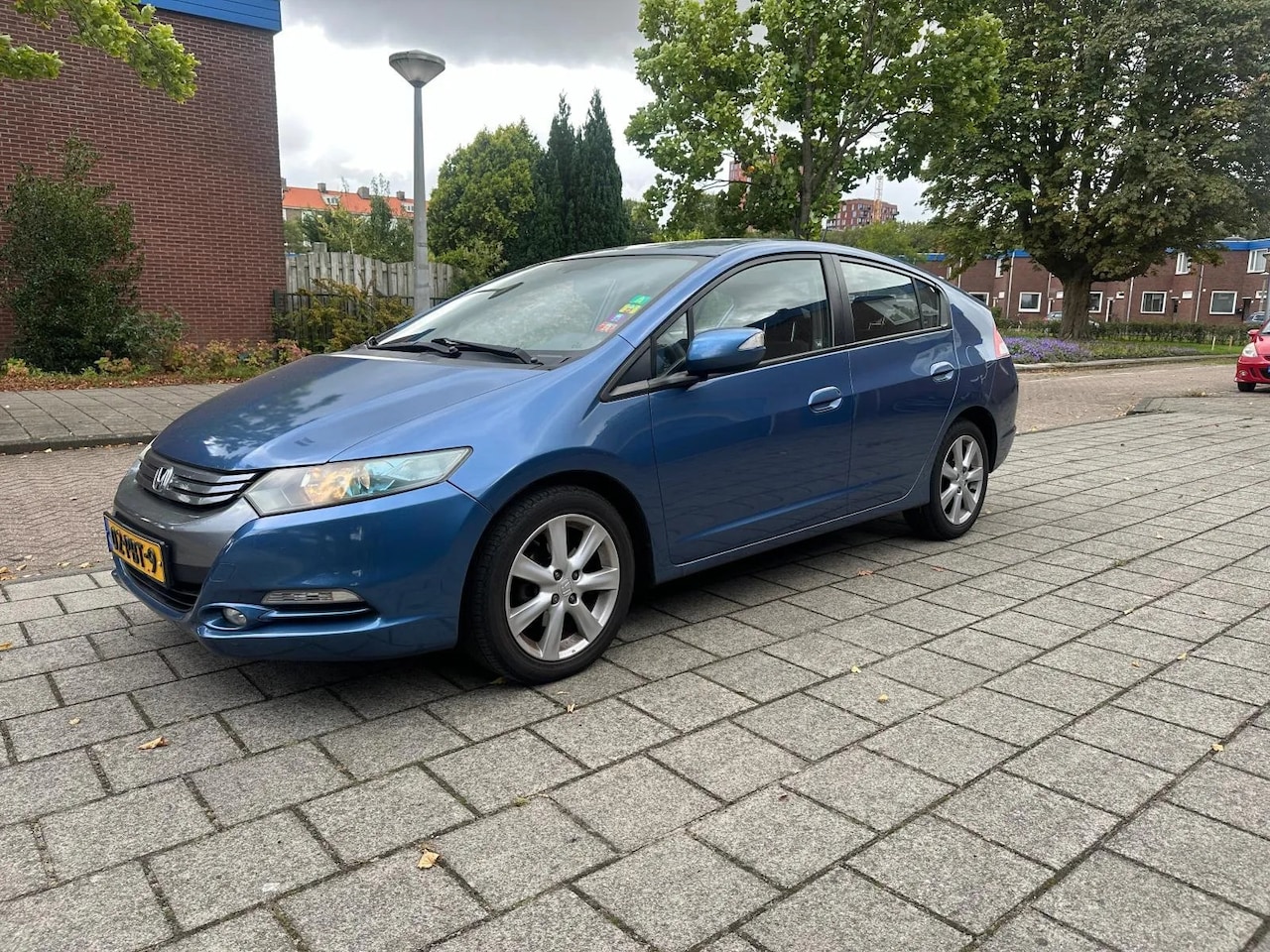 Honda Insight - 1.3 IMA Hybrid Elegance Automaat Winterbanden - AutoWereld.nl