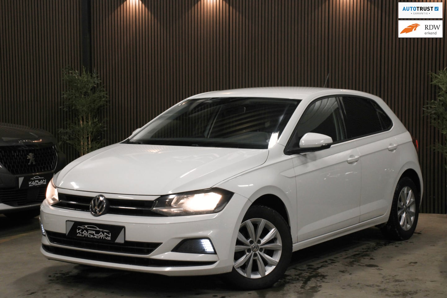 Volkswagen Polo - 1.0 TSI Highline DSG ACC CarPlay Stoelverw Climate - AutoWereld.nl