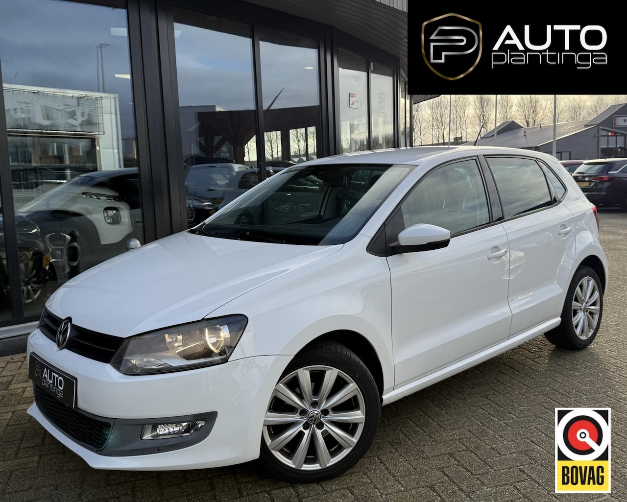 Volkswagen Polo - 1.2 TSI Comfortline 105PK | TEAM | Stoelverwarming | Cruise Control | Airco | Parkeersenso - AutoWereld.nl