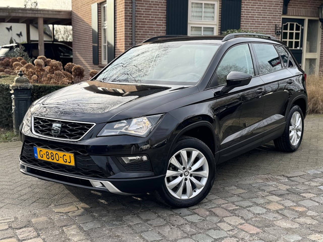 SEAT Ateca - 1.5 TSI 150pk Style ecc,navigatie,cruise,lmv,dglas - AutoWereld.nl