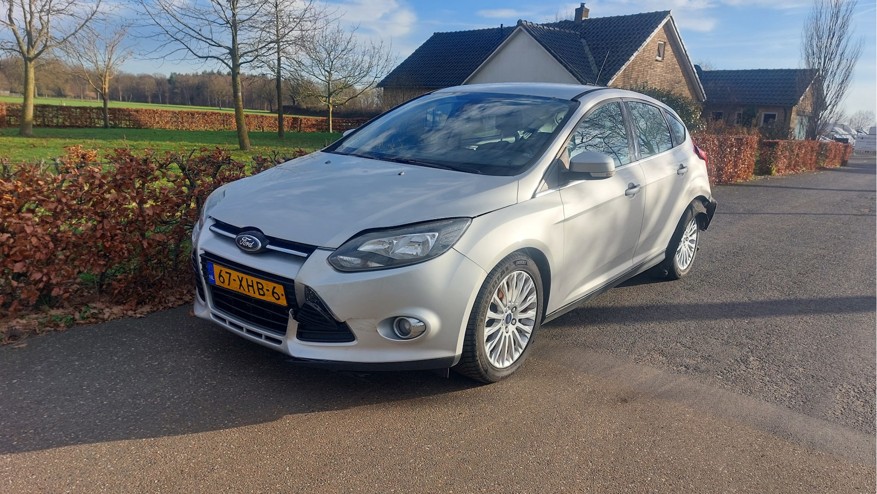 Ford Focus - 1.6 EcoBoost First Edition CLIMA/NAVI BJ 2012 - AutoWereld.nl