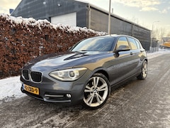 BMW 1-serie - 114i Business+ / SPORT / LEER / SCHUIFDAK / NAVI / STOELVERWARMING