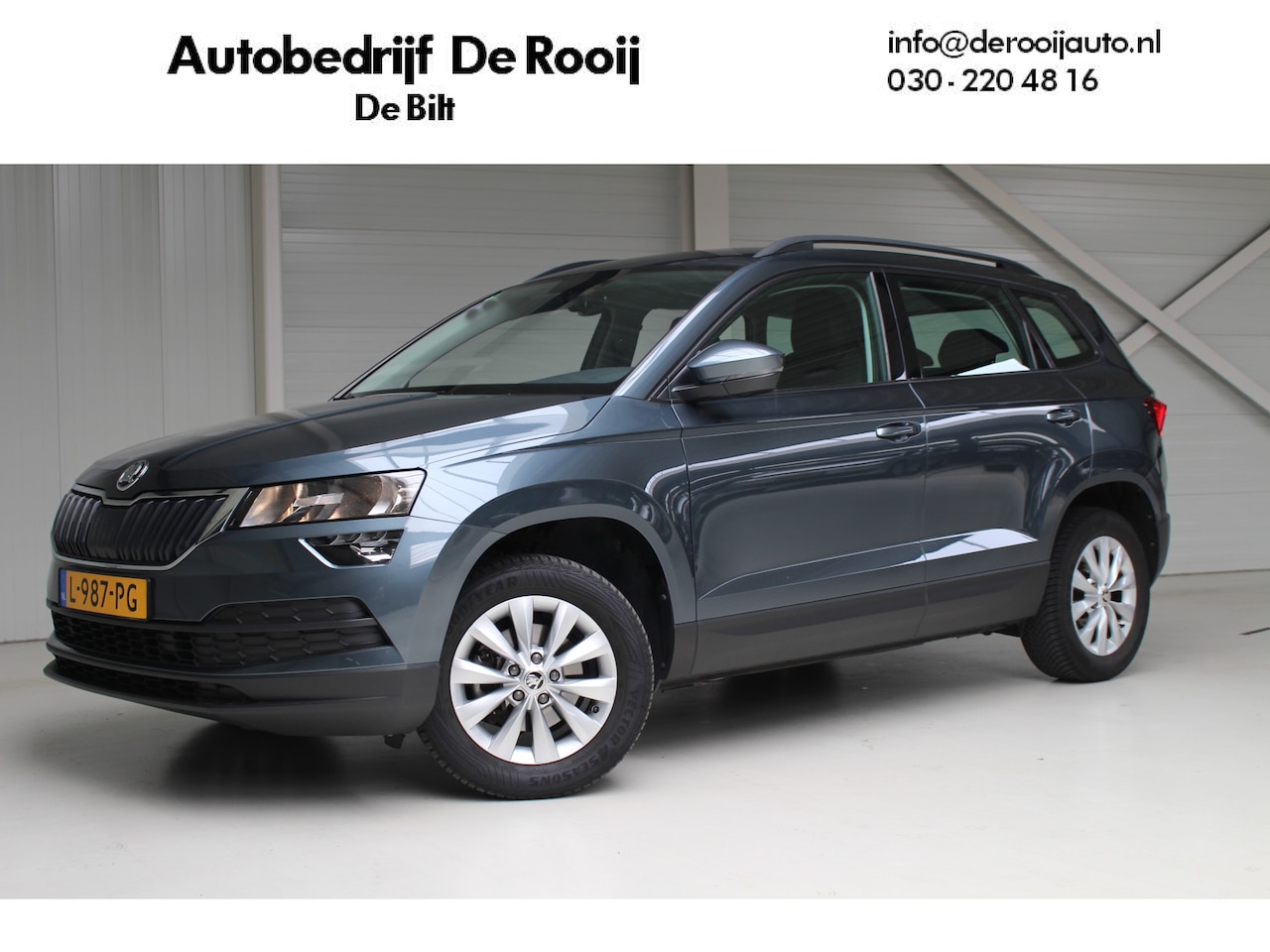 Skoda Karoq - 1.0 TSI Business Edition | Airco | Navigatie | PDC-Achter | Trekhaak - AutoWereld.nl