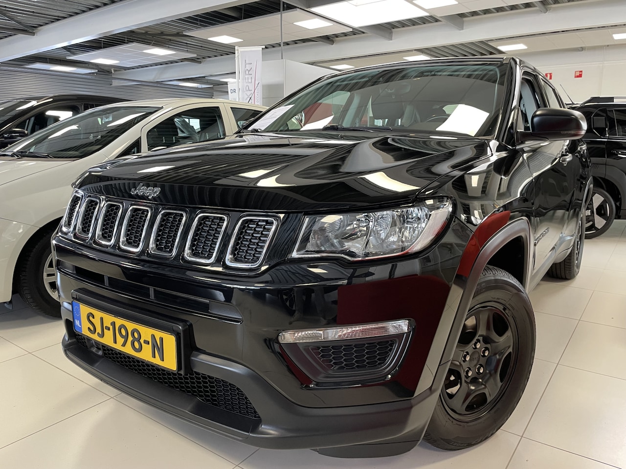 Jeep Compass - 1.4 MultiAir Sport | Trekhaak Meer foto's volgen! - AutoWereld.nl