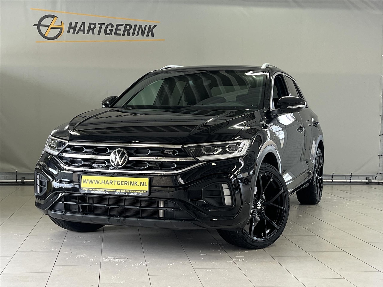 Volkswagen T-Roc - 1.5 TSI 150pk 7-DSG R-Line *NAVI/A-CRUISE/PDC/CAMERA - AutoWereld.nl