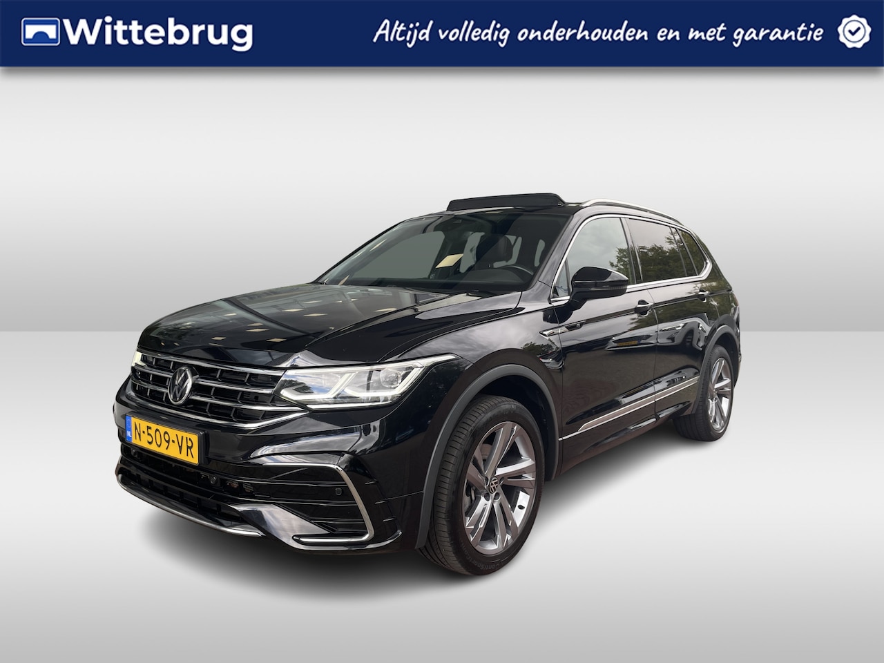 Volkswagen Tiguan Allspace - 1.5 TSI R-Line Business+ 7p. / Panorama dak / Keyless / Navi / Camera / Stoelverwarming / - AutoWereld.nl