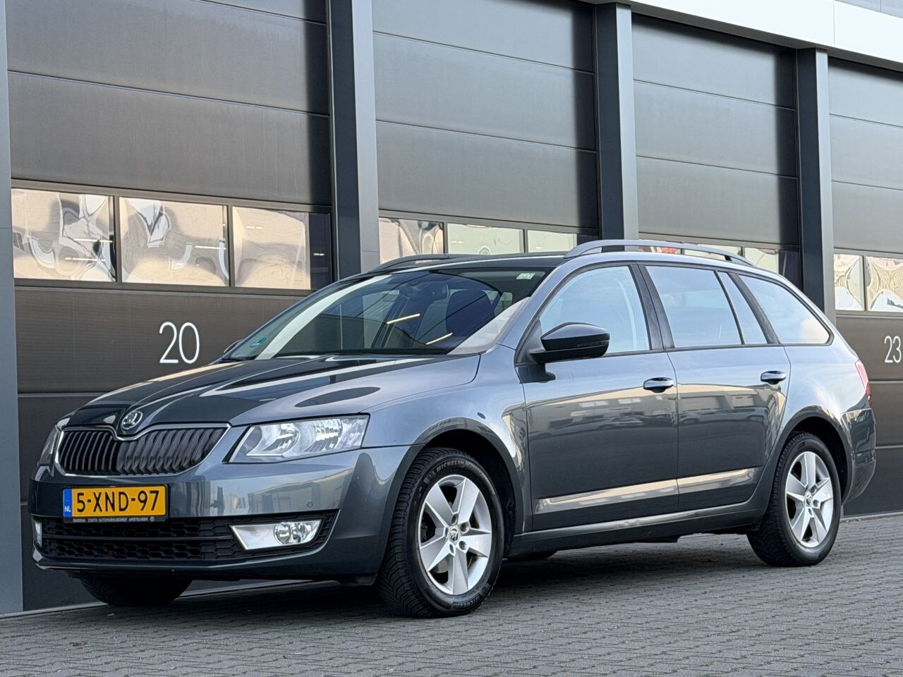 Skoda Octavia - 1.6 TDI Navi Clima PDC - AutoWereld.nl