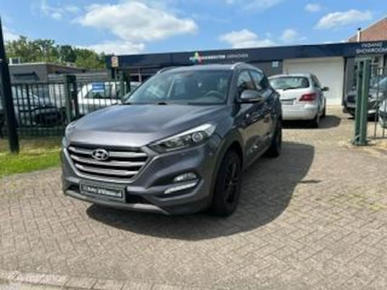 Hyundai Tucson - 1.6 GDi/navi/6-24 mnd garantie mogelijk. - AutoWereld.nl