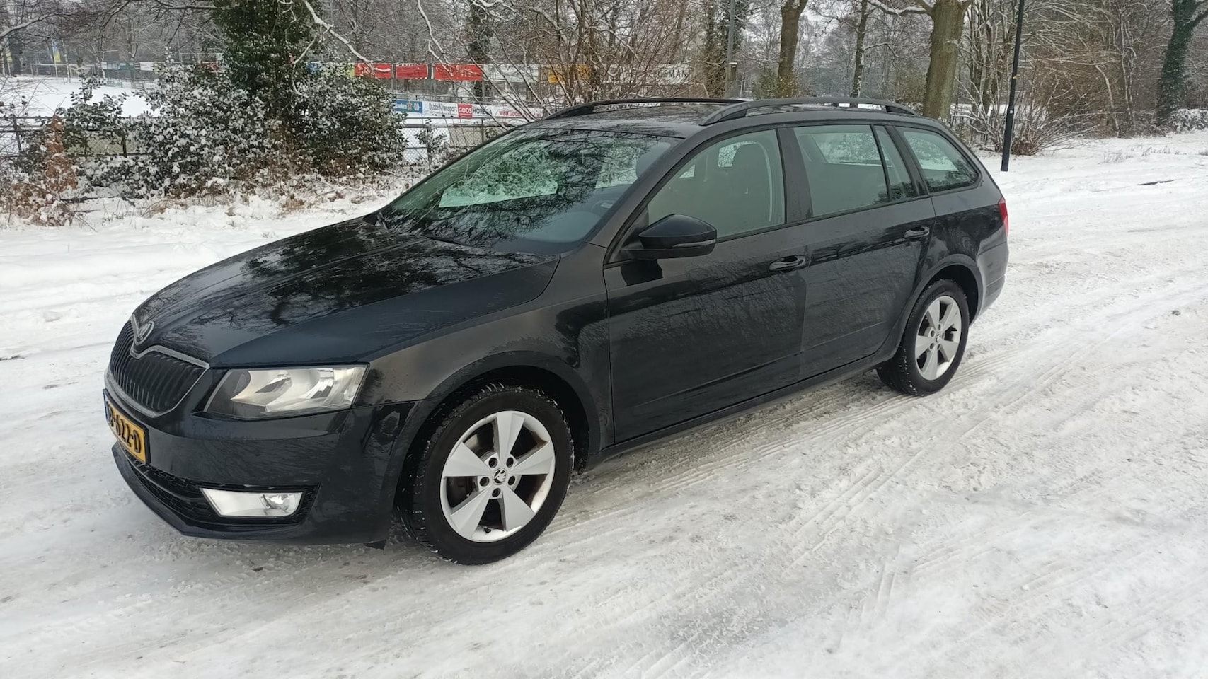Skoda Octavia Combi - 1.6 TDI Automaat / Clima / Pdc - AutoWereld.nl