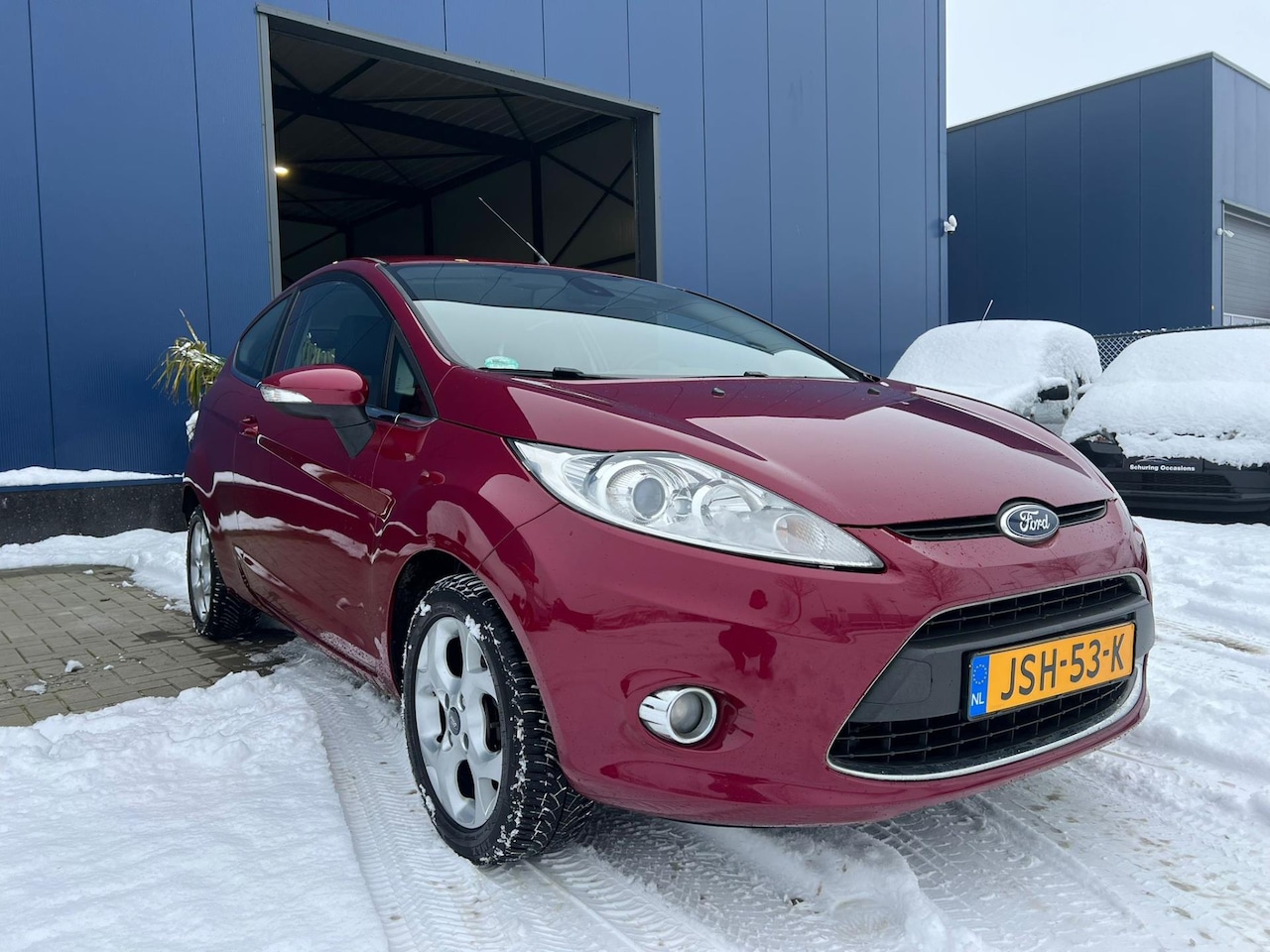 Ford Fiesta - 1.25 Titanium / NIEUWE APK / STOELVERWARMING / PDC / CLIMATE CONTROL - AutoWereld.nl