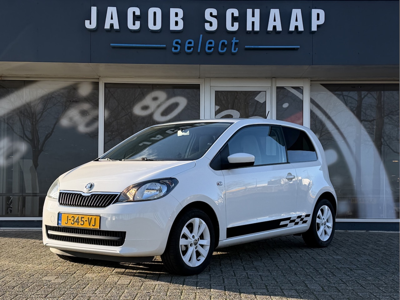 Skoda Citigo - 1.0 Greentech Ambition / Airco / Navi / Stoelverwarming / 15"LM / Getint glas - AutoWereld.nl