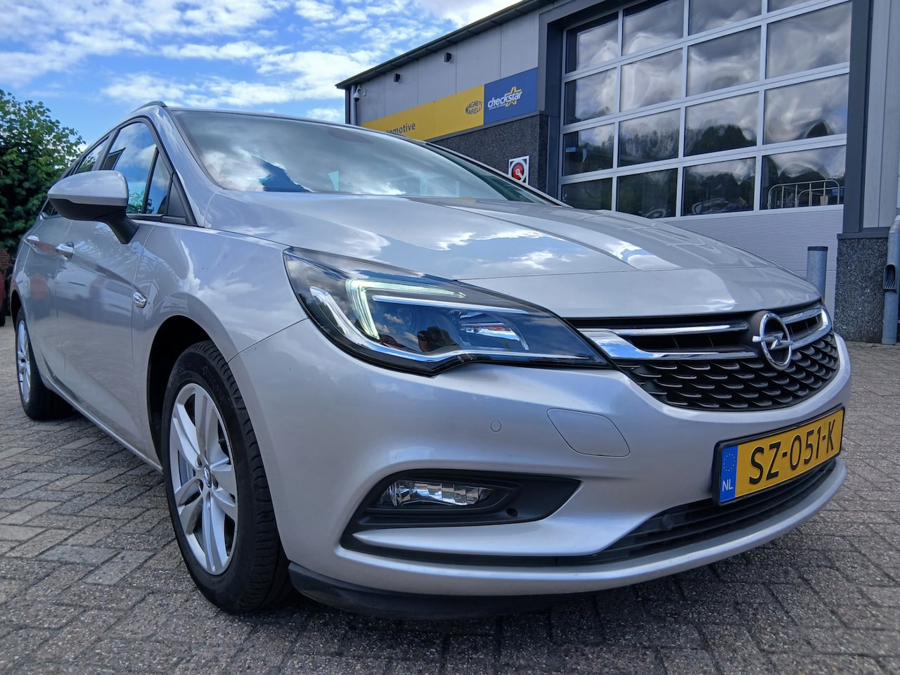 Opel Astra Sports Tourer - 1.0 Innovation - Automaat - Trekhaak - AutoWereld.nl