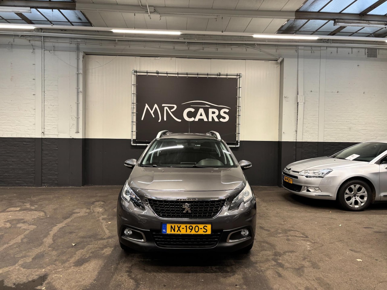 Peugeot 2008 - 1.2 PureTech Blue Lion Navi/Cruise Control/Airco - AutoWereld.nl