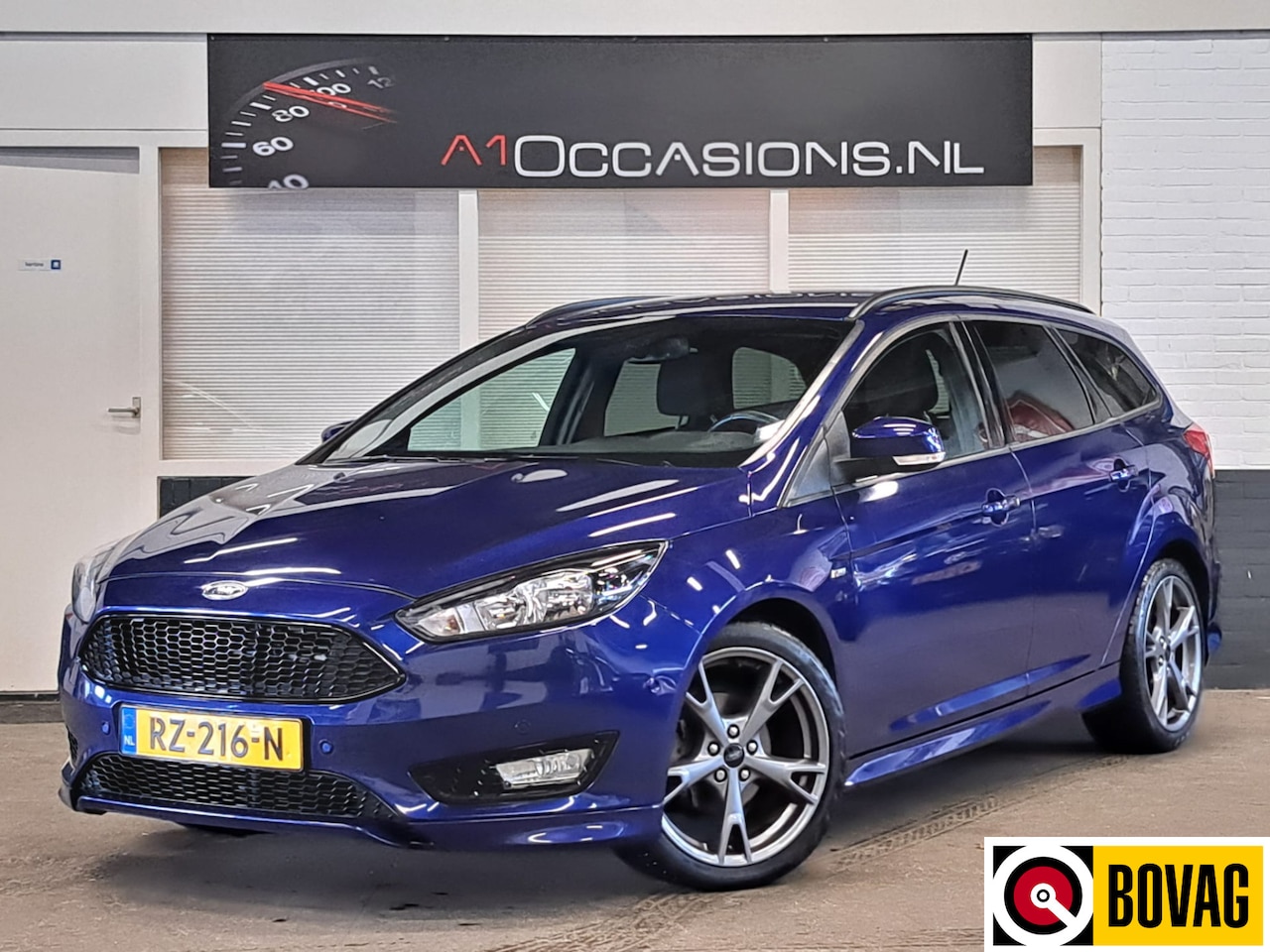 Ford Focus Wagon - 1.0 ST-Line + NAVI - AutoWereld.nl
