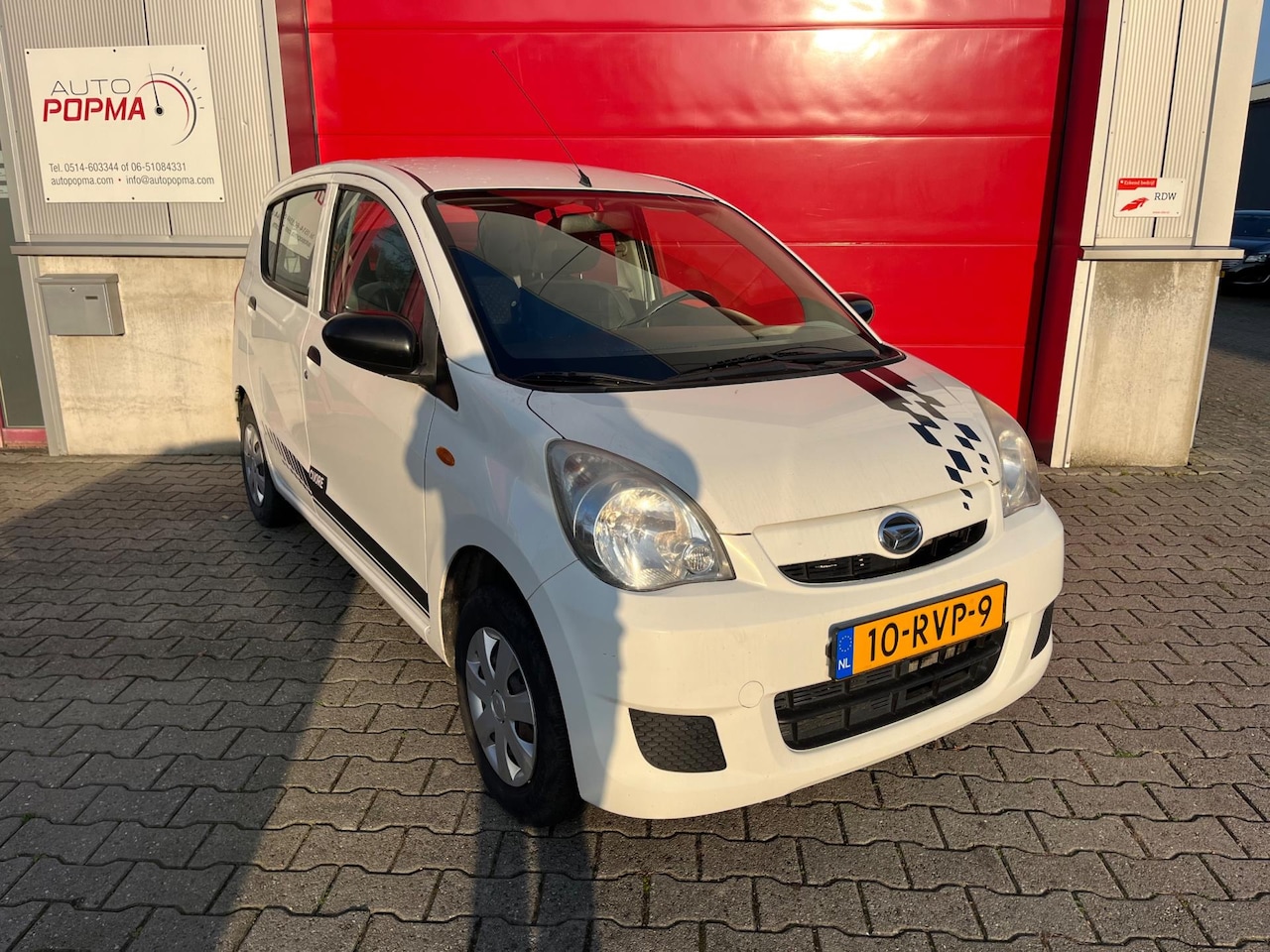 Daihatsu Cuore - 1.0 69 pk Comfort / Stuurbekrachtiging / Centrale portiervergrendeling / Japanse top auto - AutoWereld.nl