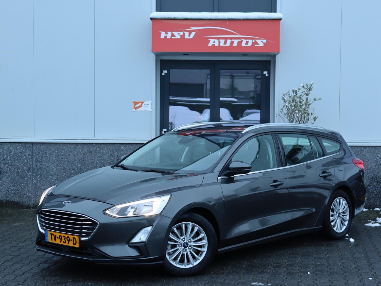 Ford Focus Wagon - 1.0 EcoBoost Titanium Business navi LM airco - AutoWereld.nl