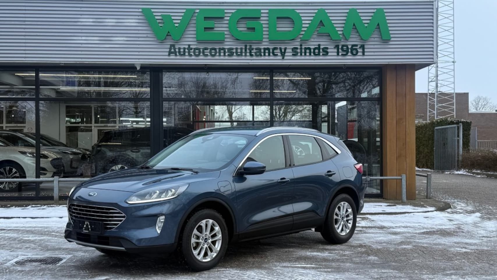 Ford Kuga - 2.5 PHEV TITANIUM / Winter pack - AutoWereld.nl