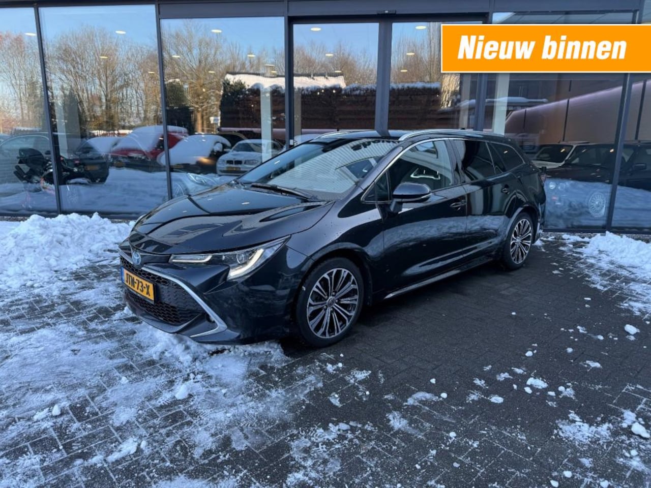 Toyota Corolla Touring Sports - Touring Sports 1.8 HYBRID Premium,Vol Leer,LED,HUD,Adapt Cruise,Camera,Stoelverw - AutoWereld.nl