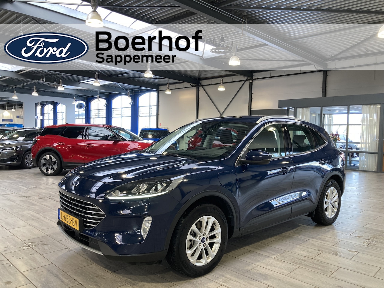 Ford Kuga - 2.5 PHEV 225 pk Titanium | Adapt. cruise | El. a. klep | 2 Camera's | Navi | Apple Carplay - AutoWereld.nl