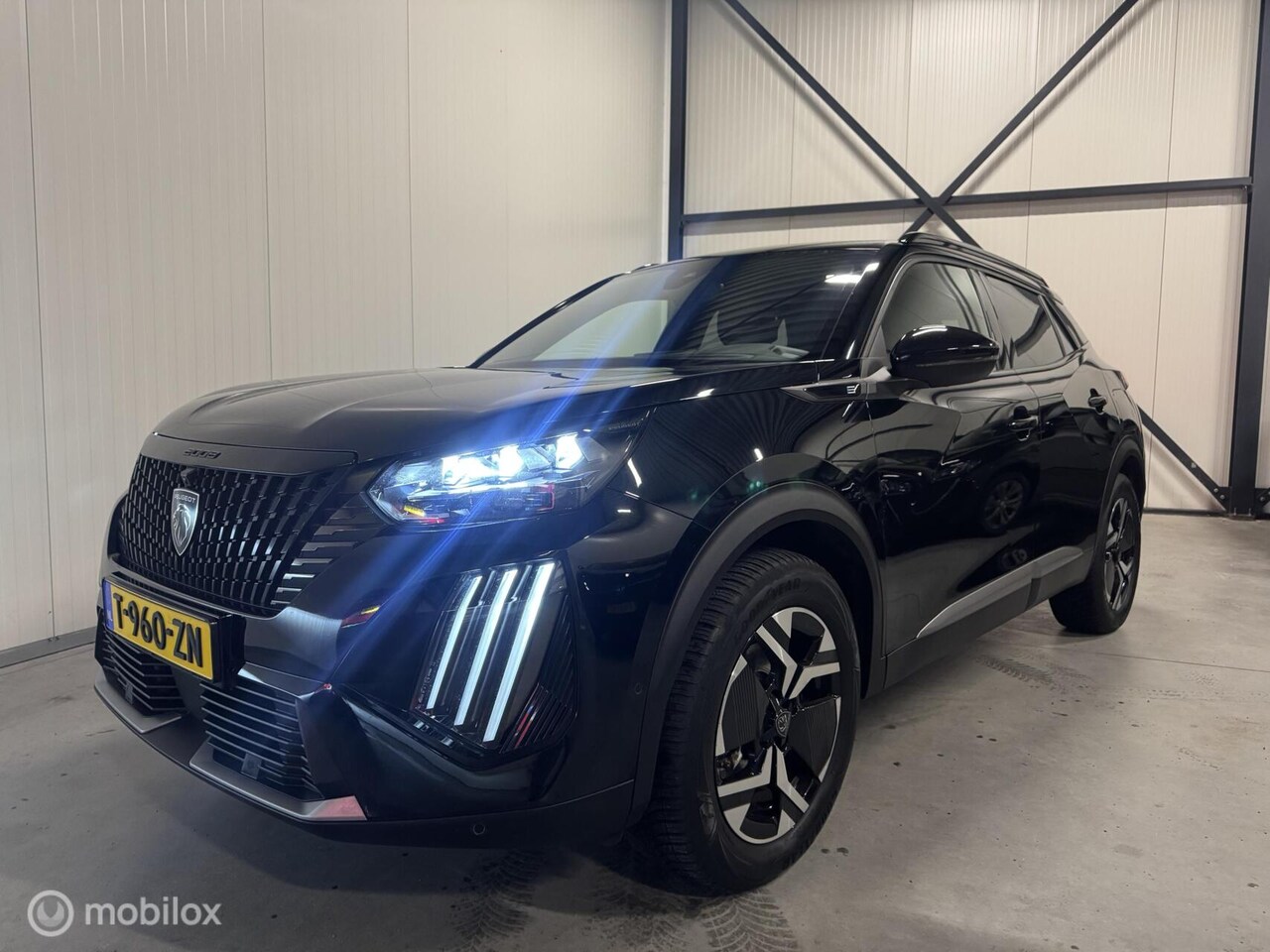 Peugeot e-2008 - EV GT 54 kWh SOH 95% - AutoWereld.nl