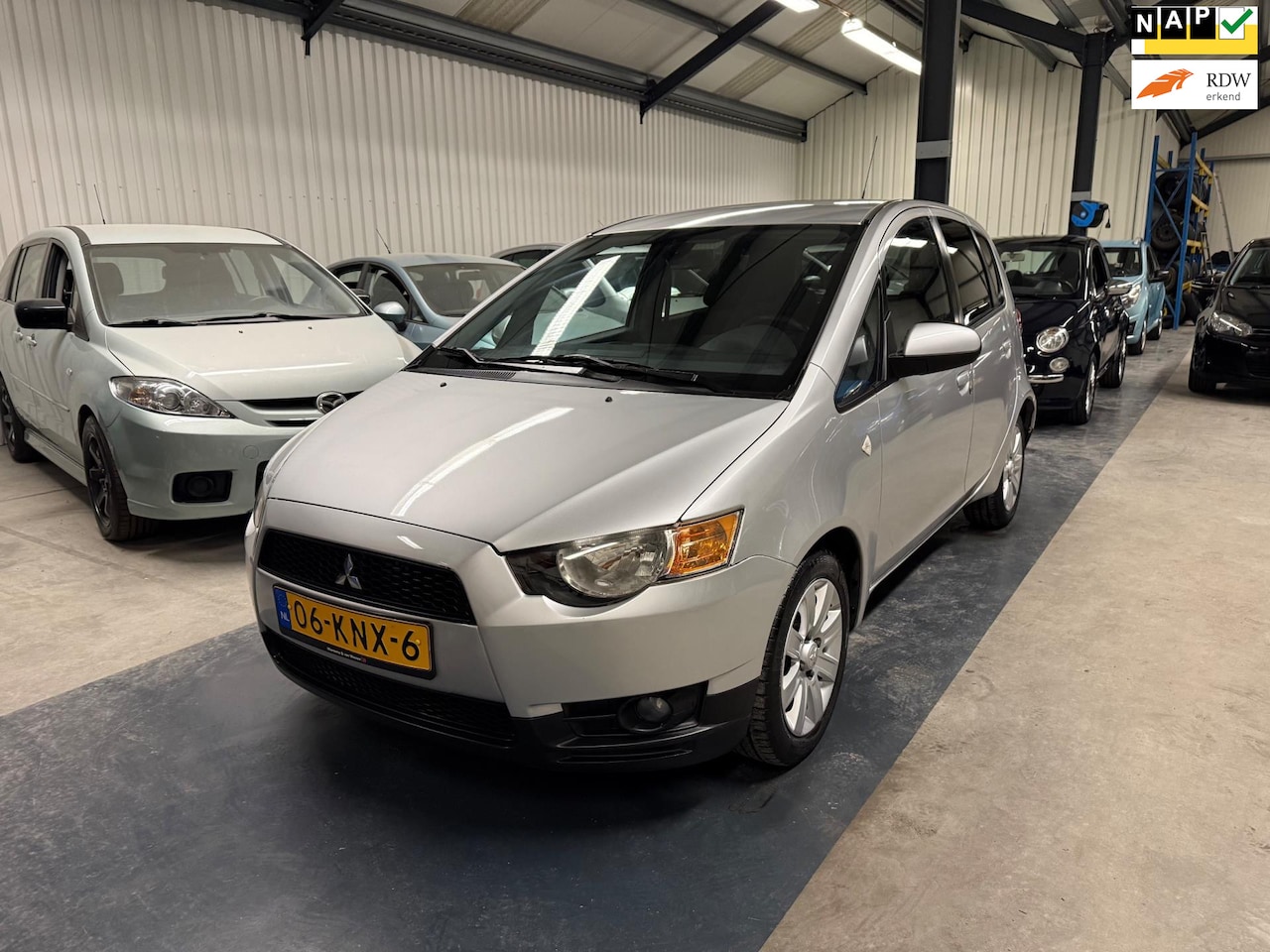 Mitsubishi Colt - 1.3 Edition Two LAGE KM/5 DEURS/AIRCO/NAP/APK - AutoWereld.nl