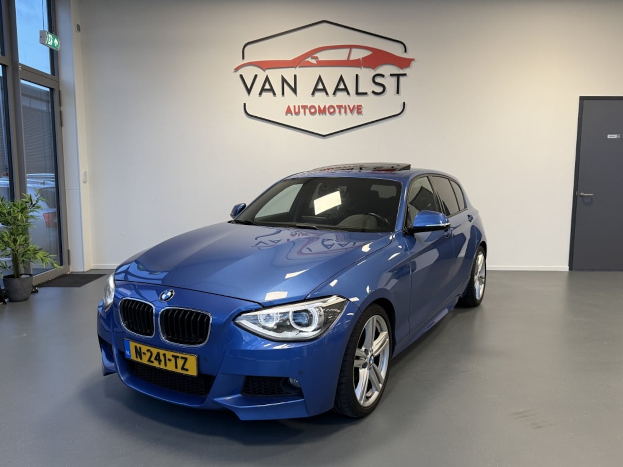 BMW 1-serie - 116i High Executive M-Sport / Automaat/ Pano/ Carplay - AutoWereld.nl