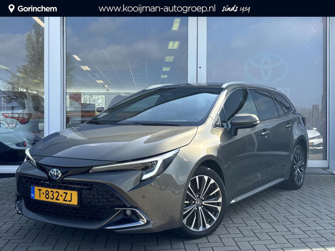 Toyota Corolla Touring Sports - 1.8 Hybrid First Edition | Elek. Achterklep | Parkeersensoren | Stoelverwarming | Apple Ca - AutoWereld.nl