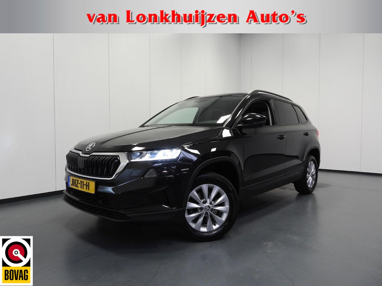 Skoda Karoq - 1.0 TSI Ambition NAVI/CAMERA/CLIMA/LED/16"LMV! - AutoWereld.nl