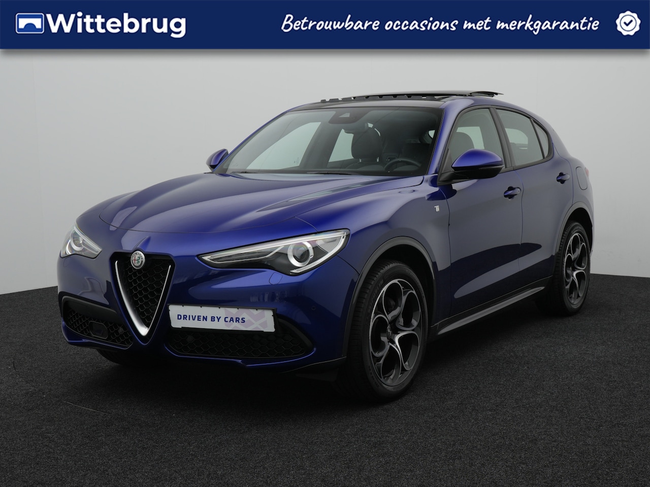 Alfa Romeo Stelvio - 2.0 T AWD Ti | Lederen bekleding | Panoramisch schuif/kanteldak - AutoWereld.nl