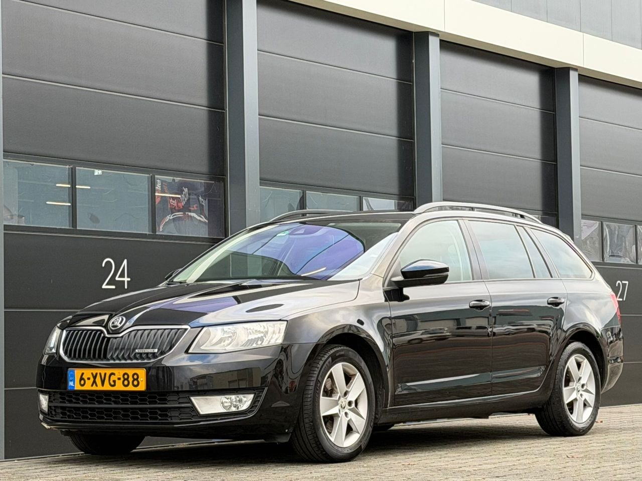 Skoda Octavia - 1.6 TDI Navi Clima PDC - AutoWereld.nl