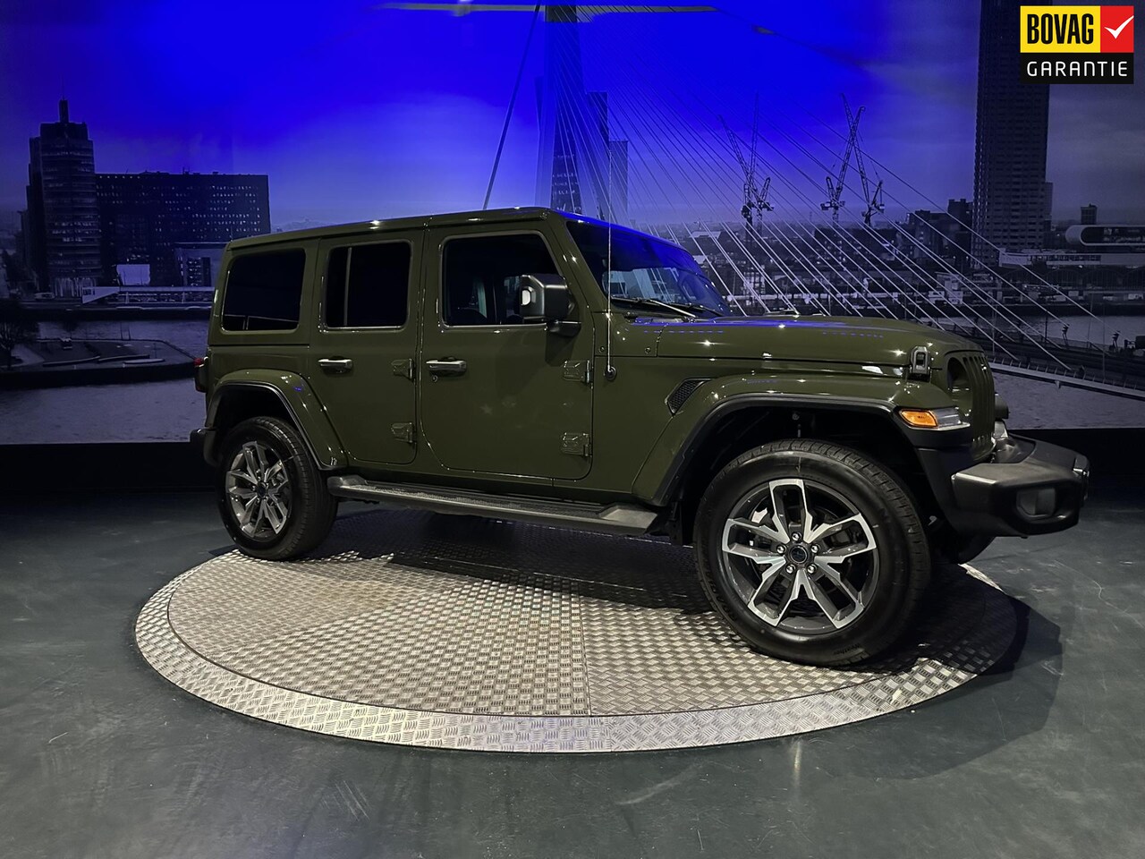 Jeep Wrangler Unlimited - 4xe 380 Sahara *ACC*Camera*Leer*Sarge Green Clear Coat* - AutoWereld.nl