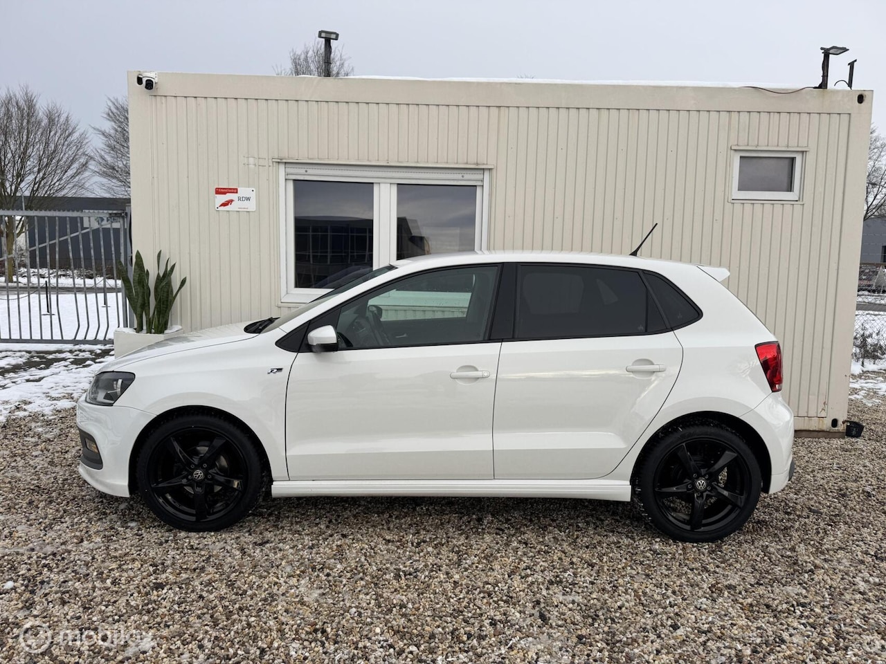 Volkswagen Polo - 1.2 R-Line Navigatie Airco New APK - AutoWereld.nl